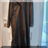 H11. Leather full length coat with fur trim by A&S Selections. - $250 